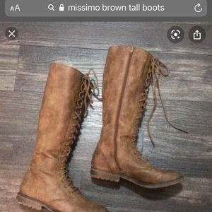 Tall light brown lace up boots